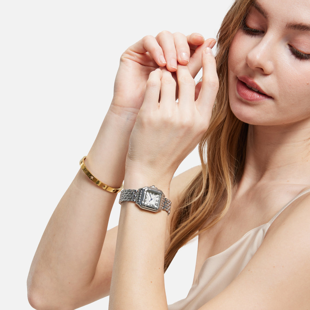 GREALY MAINSINA HORLOGE