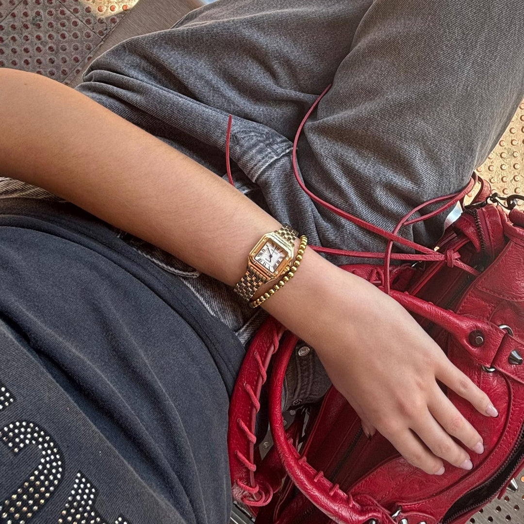 GREALY MAINSINA HORLOGE