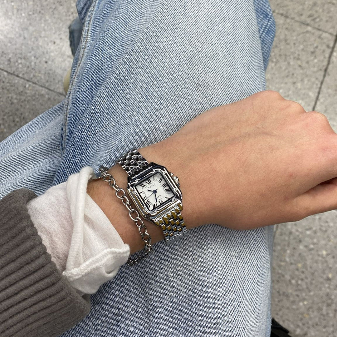 GREALY MAINSINA HORLOGE